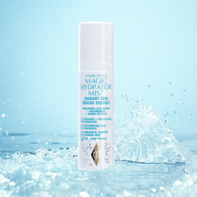 Charlotte Tilbury Magic Hydrator Mist used over makeup for dewy setting.