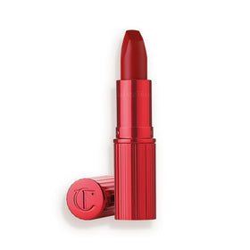 Charlotte Tilbury Matte Revolution lipstick swatch in cinematic red for bold, long-lasting color.