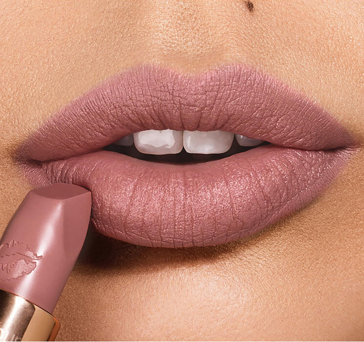 Very Victoria on lips demonstrates long-wear color for everyday use.