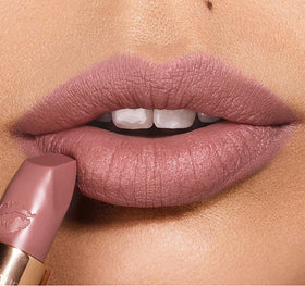 Very Victoria on lips demonstrates long-wear color for everyday use.