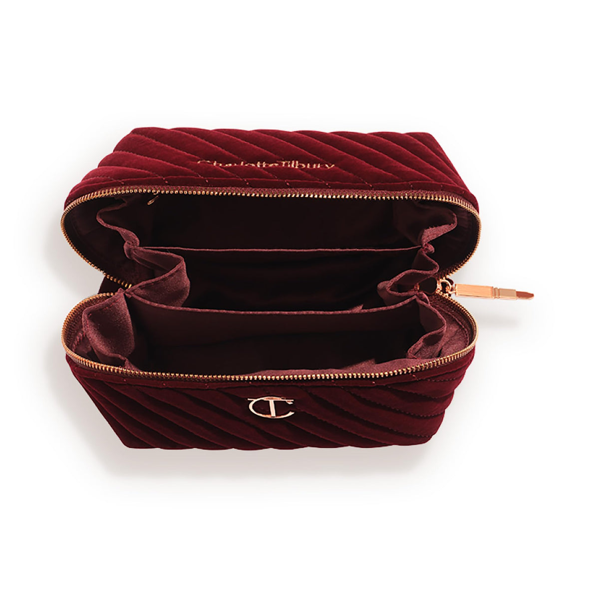Charlotte Tilbury makeup bag interior with three compartments keeps makeup and skincare neatly separated