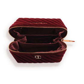 Charlotte Tilbury makeup bag interior with three compartments keeps makeup and skincare neatly separated