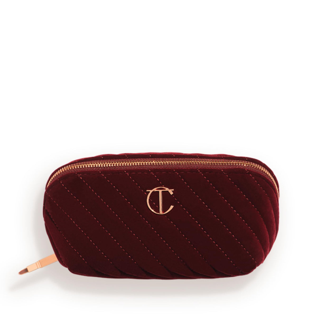 Charlotte Tilbury medium travel makeup bag in night crimson velvet exterior for elegant organization