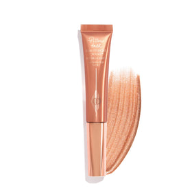 Charlotte Tilbury Pillow Talk Beauty Light Wand boosts cheekbone glow with pearlescent radiance.