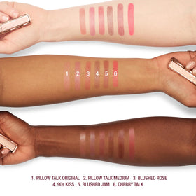 Charlotte Tilbury Pillow Talk Blush Balm Lip Tint shows pH-custom color blooming with lips.