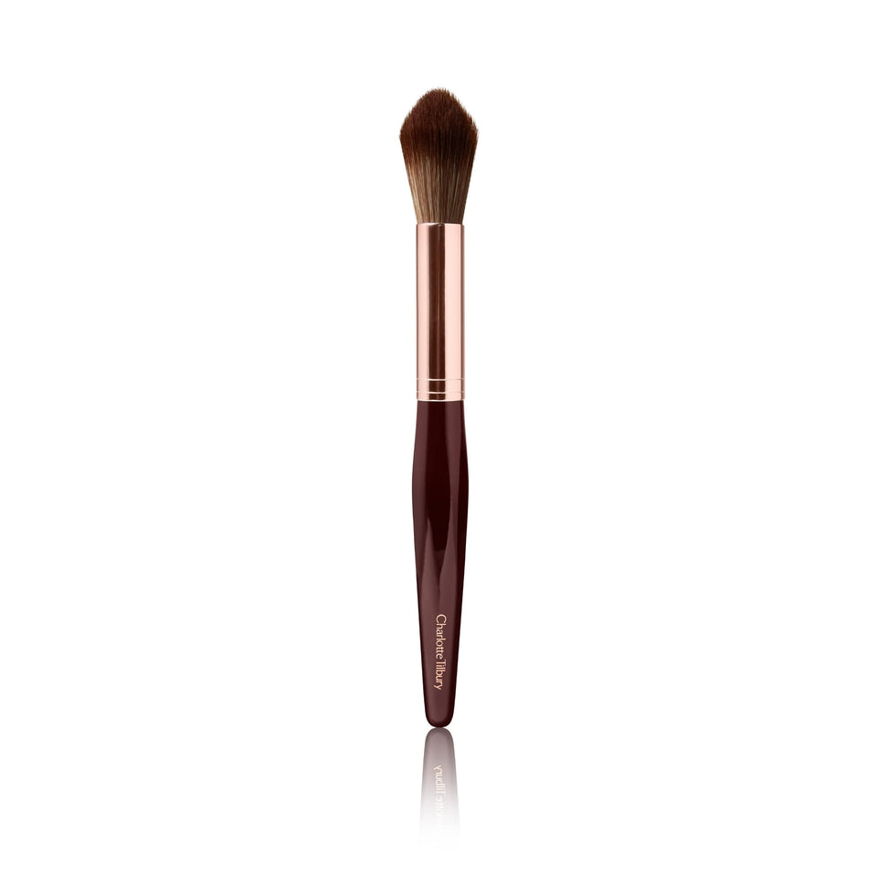 Charlotte Tilbury Powder & Sculpt Brush for precise contouring and soft highlight on cheeks and nose