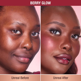 Charlotte Tilbury Unreal Healthy Glow Blush Stick Berry Glow applied to lips for juicy, rosy sheen.