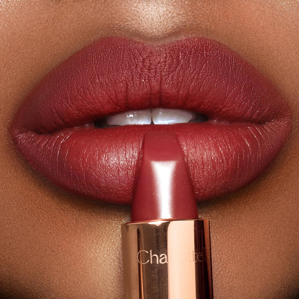 Charlotte Tilbury Walk Of No Shame lips swatch showing soft modern matte glow.