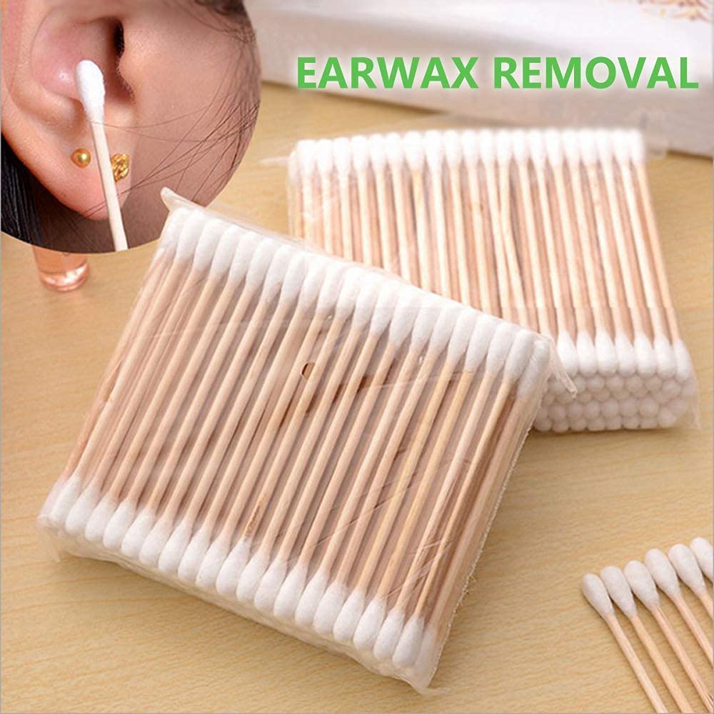Chenchenchen organic cotton tips with wooden sticks for skin care routines.