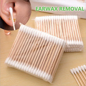 Chenchenchen organic cotton tips with wooden sticks for skin care routines.