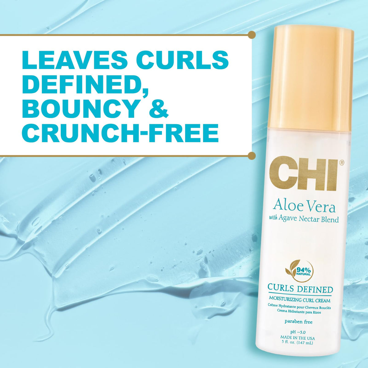 Hands applying CHI curl cream to damp hair for smooth frizz control