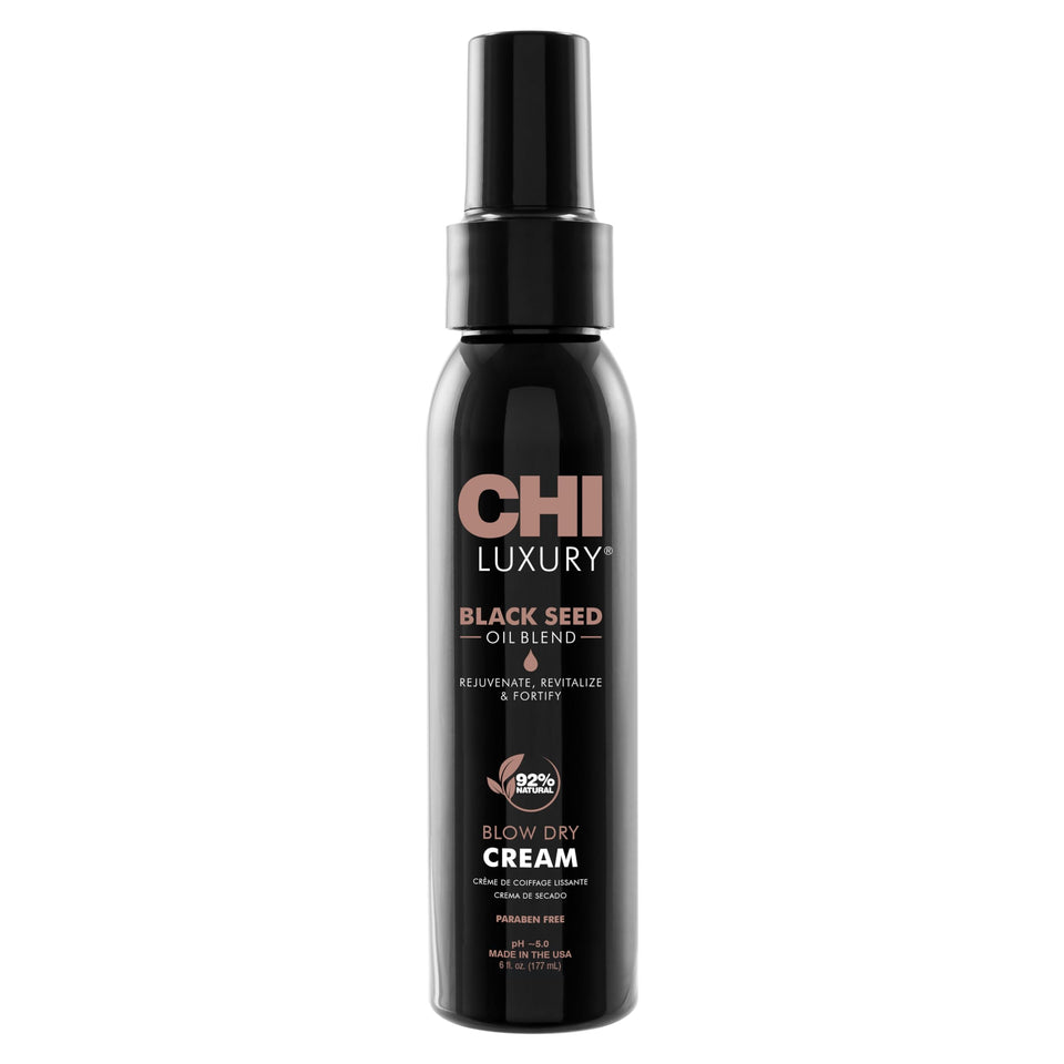 CHI Luxury Black Seed Oil Blow Dry Cream bottle glows with frizz control and shine.