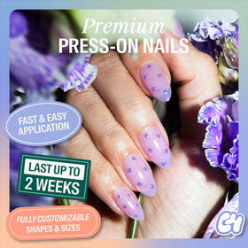 Chillhouse almond tips closeup with lavender glow and daisy embellishments