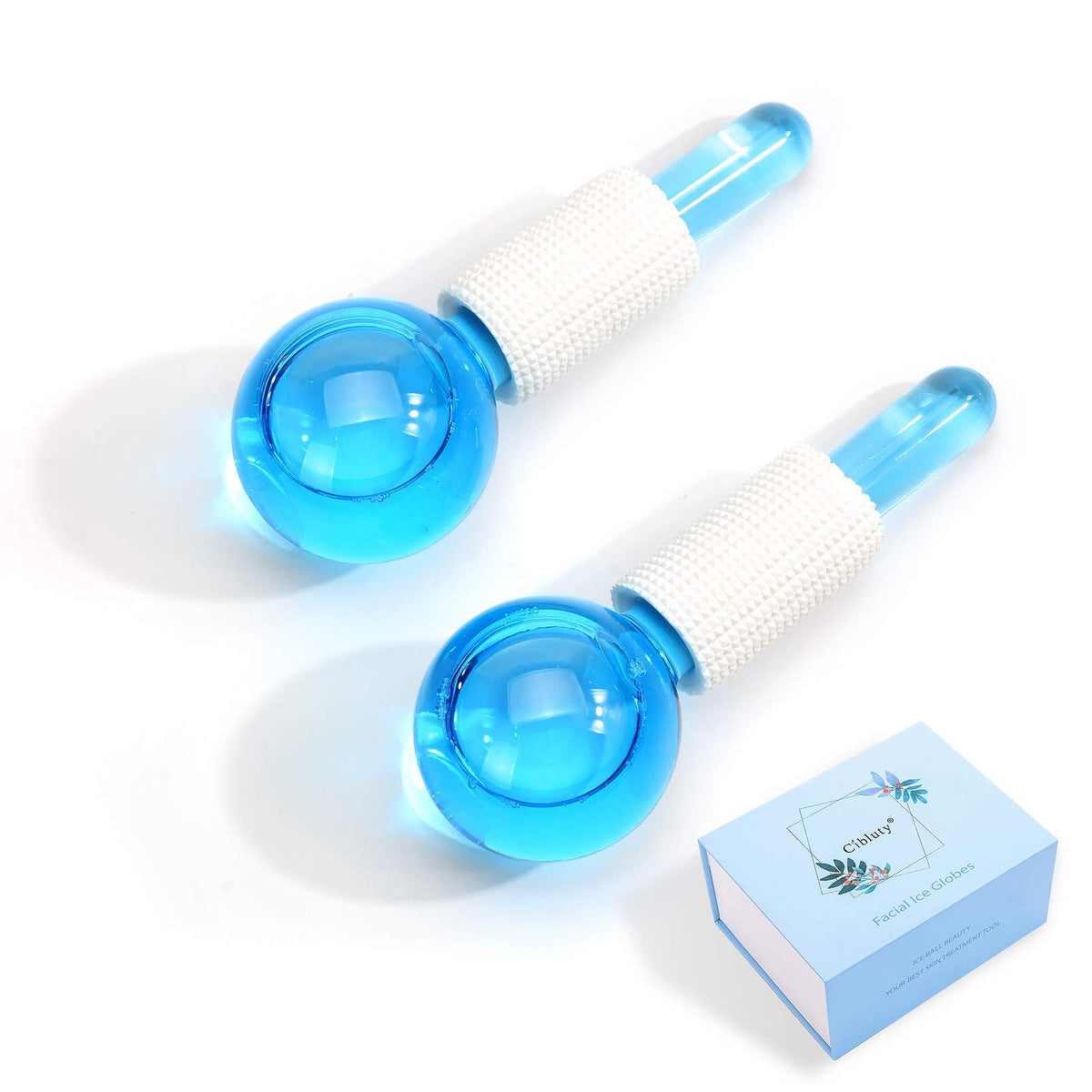 Close-up of CIBLUTY Ice Globes cooling the cheek for gentle de-puffing.