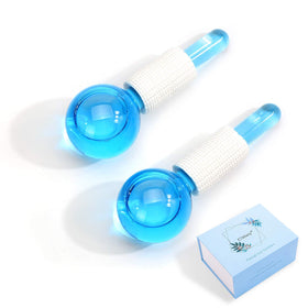 Close-up of CIBLUTY Ice Globes cooling the cheek for gentle de-puffing.