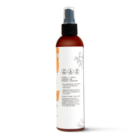 CIBU Curl + Coil frizz-control spray applied on damp hair