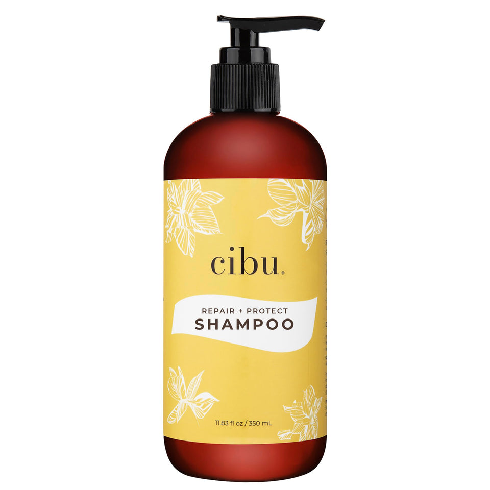 CIBU Repair & Protect shampoo bottle with refreshing scent helps reduce breakage in damaged hair.