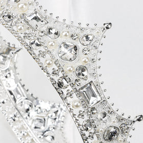 CIEHER royal crown detail highlighting baroque elements from the side.