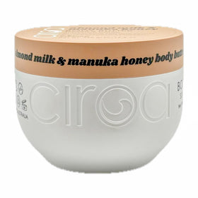 Ciroa Almond Milk Manuka Honey Body Butter tub on vanity highlights generous size