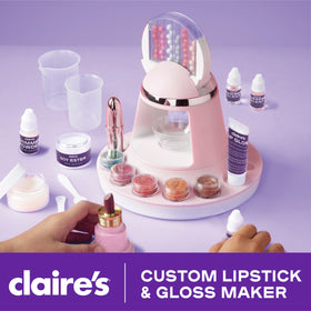 Claire’s kit gloss containers ready for personalized lip looks.