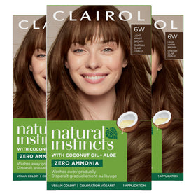Clairol Natural Instincts 6W bottle close-up with warm brown shade ready to apply