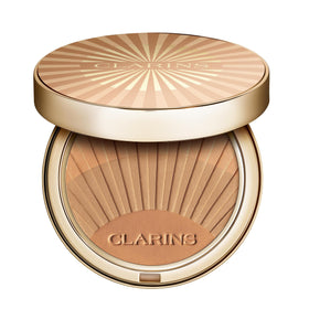 Clarins bronzing powder compact open showing the buildable shade options