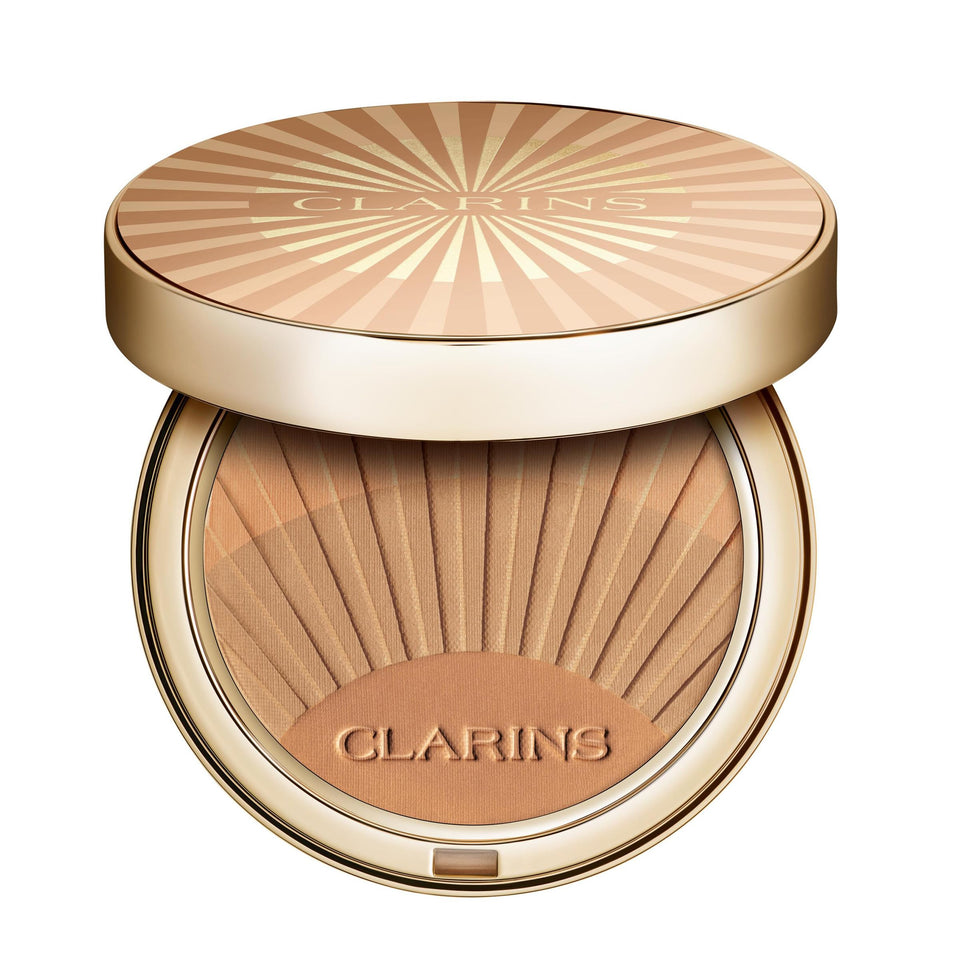 Clarins bronzing powder compact open showing the buildable shade options
