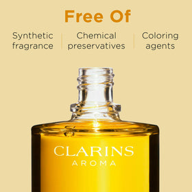 Clarins Contour Body Treatment Oil texture close-up reveals silky finish