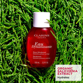 Clarins Eau Dynamisante spray nozzle delivering refreshing odor-control mist