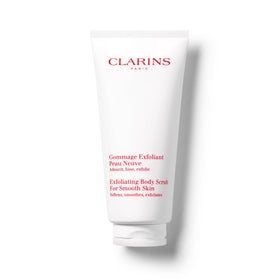 Clarins Exfoliating Body Scrub bottle closeup showing premium formula for smooth skin.