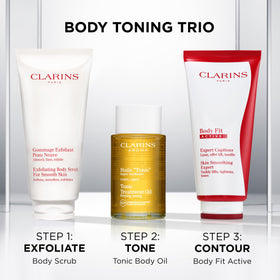 Packaging displayed on counter highlights natural-origin particles of the scrub.