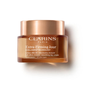 Clarins Extra-Firming Day Moisturizer bottle cap close-up for easy daily use.