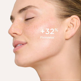 Neck and décolleté area treated with Clarins Extra-Firming Day Moisturizer for contouring support.