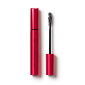 Clarins Lash & Brow Double Fix Mascara bottle closeup with clear gel hold.