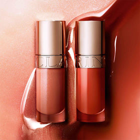 Natural-origin label on Clarins Lip Comfort Oil emphasizing hydration and care.