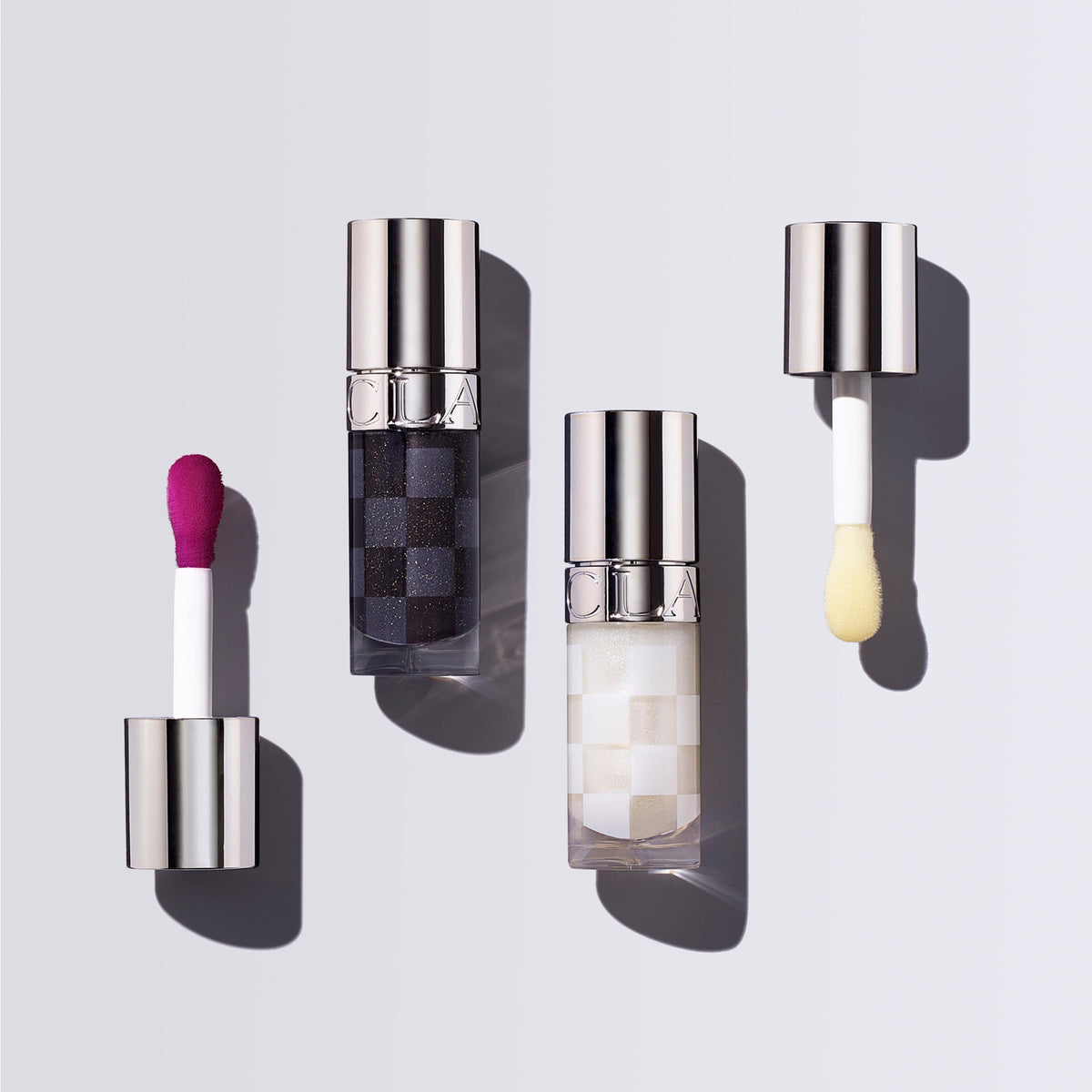 Clarins Lip Comfort Oil packaging with compact, easy applicator