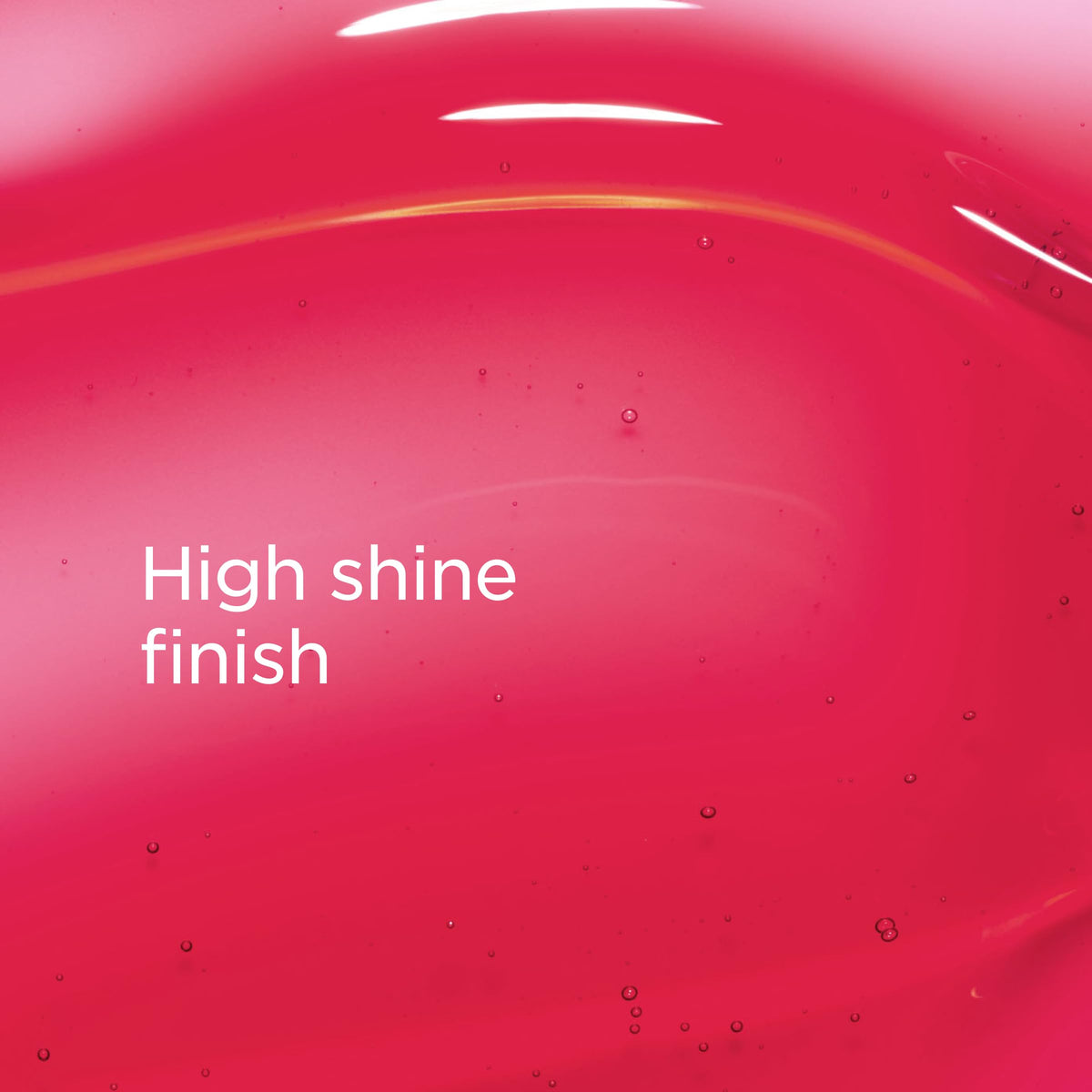 Clarins Lip Comfort Oil packaging closeup showing sleek bottle.