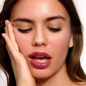 Clarins Lip Comfort Oil adds a luminous shine layer