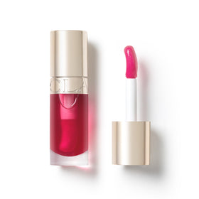 Clarins Lip Comfort Oil shines on lips with subtle color and hydration.