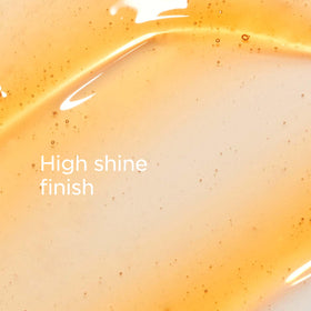 Clarins Lip Comfort Oil texture close-up highlights comfortable glide