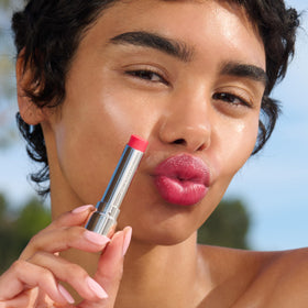 Top lipstick with Clarins Lip Oil Balm Pitaya for extended hydration
