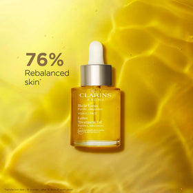Clarins Lotus Face Oil Treatment pump for smooth, even application