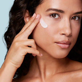 Clarins night cream patted on neck-and-decollete