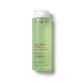 Clarins Purifying Toning Lotion bottle demonstrates alcohol-free formula for balanced skin.