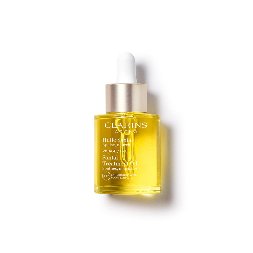 Clarins Santal Face Oil bottle showing soothing hydration for dry skin.
