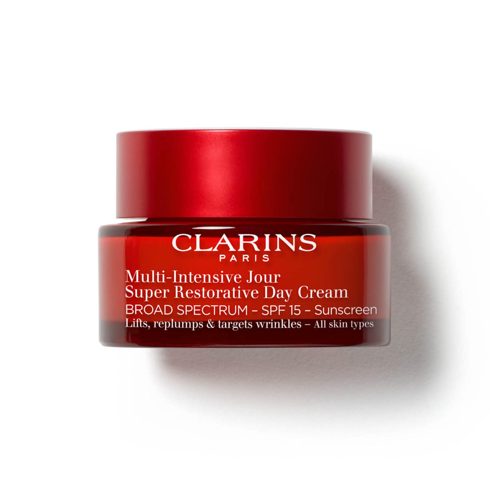Clarins Super Restorative Day Cream bottle with pump for easy daily use and SPF 15 protection.