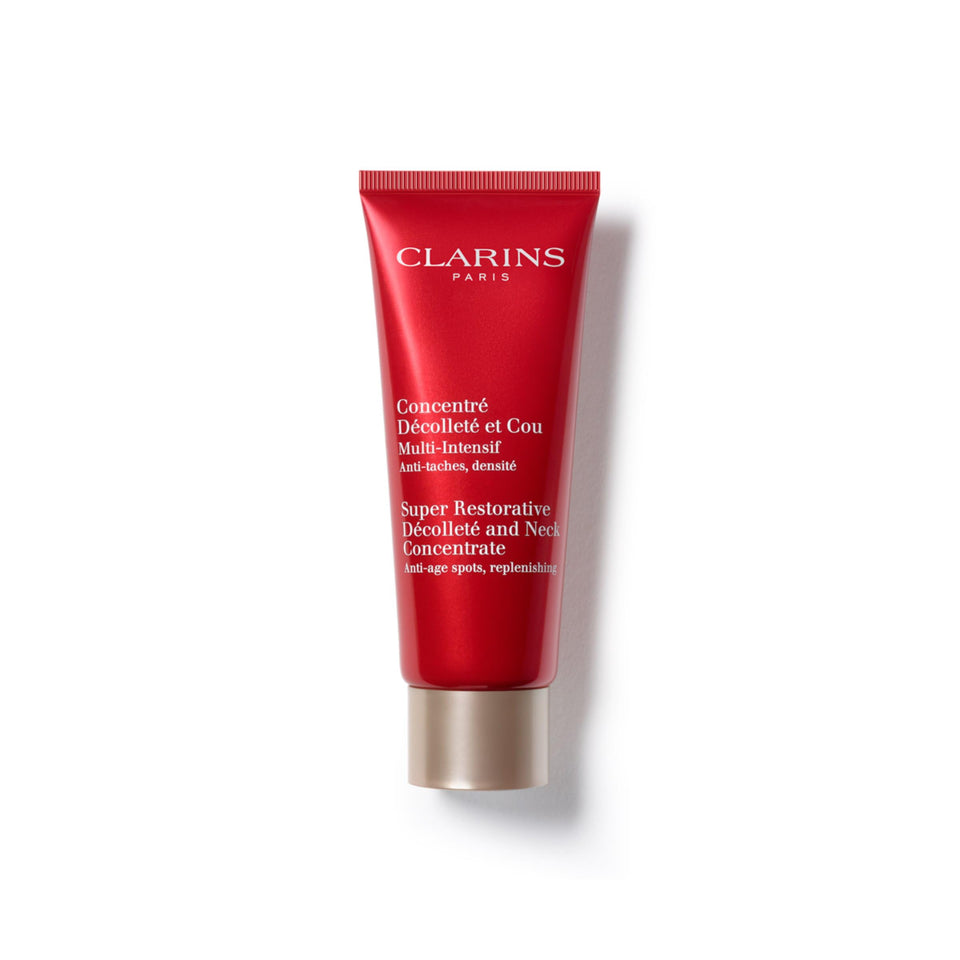 Clarins Super Restorative Decollete and Neck Concentrate bottle close-up, nourishing formula for firmer skin.