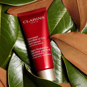 Clarins concentrate beside mirror, part of daily routine for mature skin.