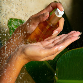 Clarins Total Cleansing Oil removing eye makeup safely.