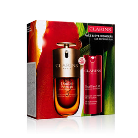 Clarins Total Eye Lift tube is shown for a refreshed eye area.